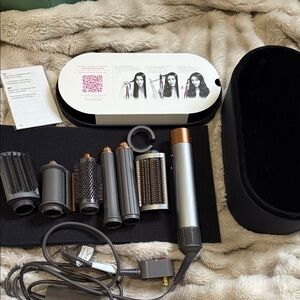 Dyson Airwrap with Copper and Gray Attachments